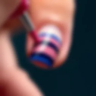 Close-up of a B Color nail wrap being applied to a nail, illustrating the application technique