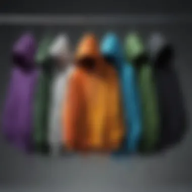 Various drippy hoodies displayed on hangers