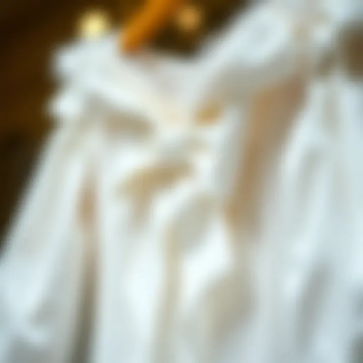 Elegant display of a white bow dress highlighting its intricate design and fabric choice