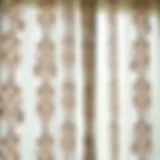 Intricate Embroidery in Sheer Fabric Elegant embroidered sheer curtain showcasing intricate patterns