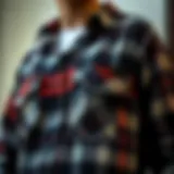 Close-up of a graphic flannel shirt showcasing intricate patterns and textures