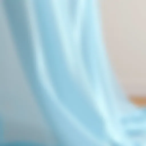 Draping Beauty of Light Blue Cheesecloth Elegant draping of light blue cheesecloth fabric
