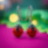 Elegant Miraculous Ladybug earrings displayed on a vibrant background