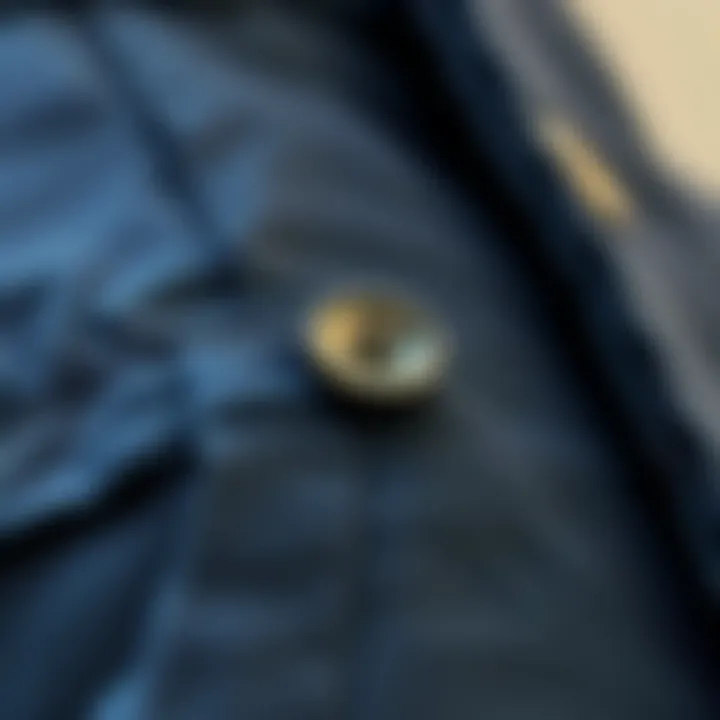 Innovative Button Extension Design Close-up view of a button extension on trousers