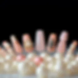 Elegant arrangement of pearl fake nails showcasing different designs