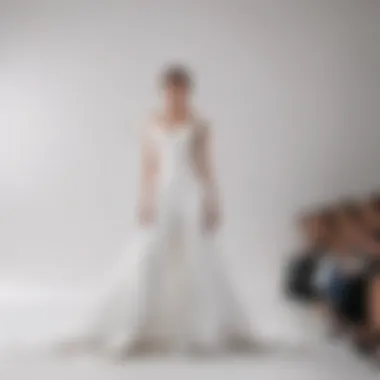 Fashion runway featuring models against a white satin backdrop