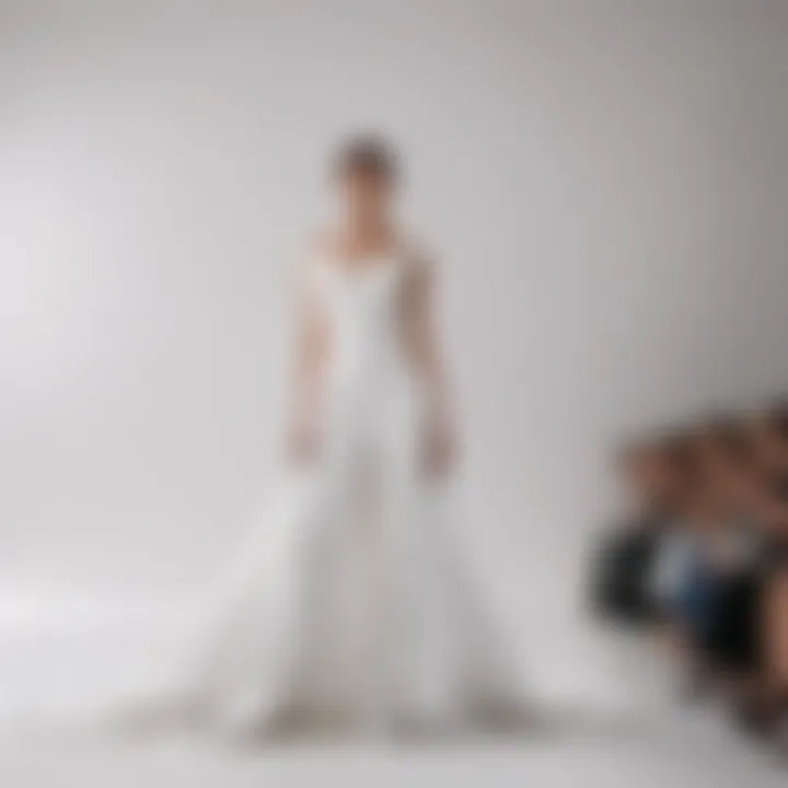 Fashion runway featuring models against a white satin backdrop