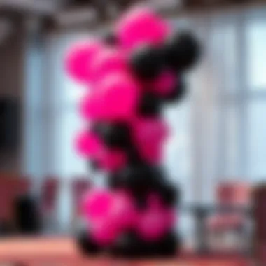 Creative balloon arrangement in hot pink and black