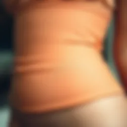 A close-up of a latex waist trainer showcasing its texture and flexibility
