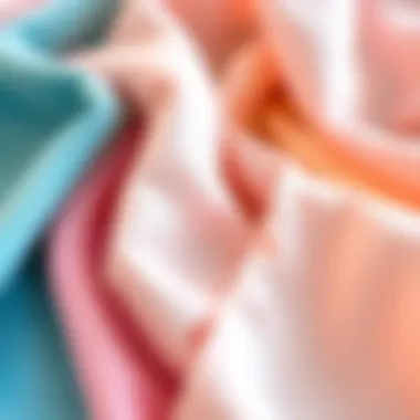 Pastel Fabric Swatches for Tablecloths Close-up of various pastel fabric swatches showcasing texture and color variety for tablecloths.