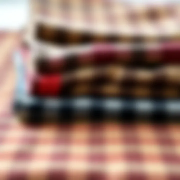 Close-up of various fabric swatches showcasing different plaid patterns