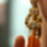 A close-up view of rhinestone tassel earrings showcasing intricate design details