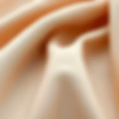 Close-up of fabric texture in nude color, emphasizing quality and comfort