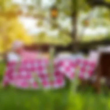 A cozy outdoor picnic scene featuring a pink buffalo check tablecloth, surrounded by nature.