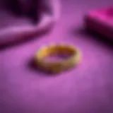 Elegant metal hair tie displayed on a velvet background