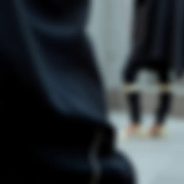 Variety of fabric textures for black pants with side stripe